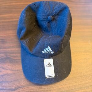 Adidas Black with  white bold logo.